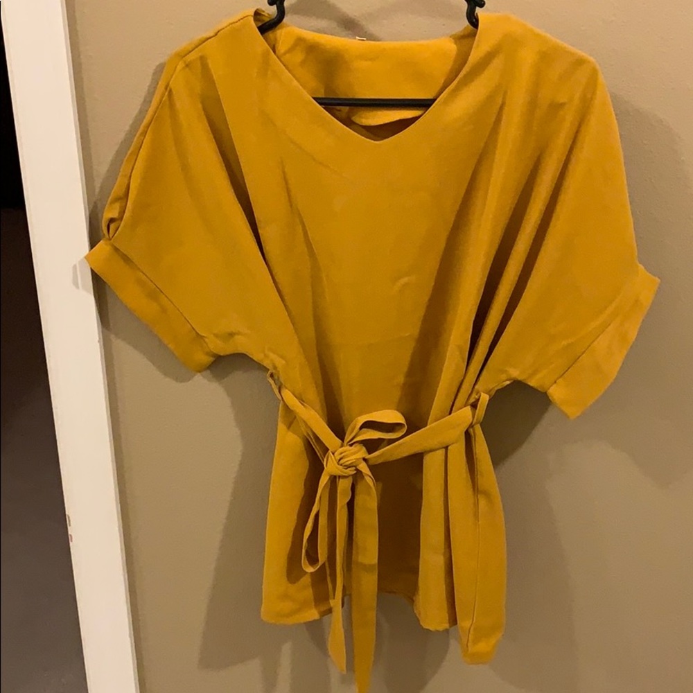 Burnt yellow blouse with tie around waist